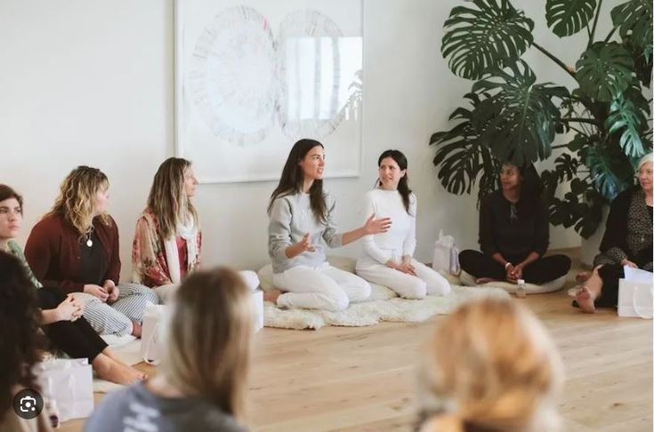 A group of women laughing and talking together